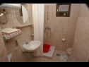 Apartments Niko - 50 m from pebble beach: SA1(2+1), SA2(2+1), SA3(2+1), A4(3+1), A5 Prizemlje(3+1), A6 Prvi kat(3+1) Pisak - Riviera Omis  - Apartment - A4(3+1): bathroom with toilet
