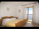 Apartments Niko - 50 m from pebble beach: SA1(2+1), SA2(2+1), SA3(2+1), A4(3+1), A5 Prizemlje(3+1), A6 Prvi kat(3+1) Pisak - Riviera Omis  - Apartment - A4(3+1): bedroom