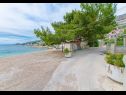Apartments Neva - 50m from the sea A1(2+1), A2(2+1), SA3(3) Sumpetar - Riviera Omis  - beach