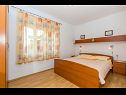 Apartments Ivan - 15 m from beach: A1(7+1), A2 Žuti (2+2), A3 Crveni (2+2) Lun - Island Pag  - Apartment - A1(7+1): bedroom