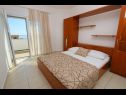 Apartments Boris - 150 m from beach: A7(2+1), A6(2+1), A4(2+2), A8(3+1), A5(4+1) Novalja - Island Pag  - Apartment - A5(4+1): bedroom
