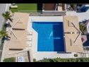Apartments Petra - with pool: A1(4+2) Novalja - Island Pag  - house