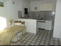 Apartments Ivan1 - 10m from the beach with parking: A1 Donji(4+1), A2 Gornji(4+1) Stara Novalja - Island Pag  - Apartment - A2 Gornji(4+1): kitchen and dining room