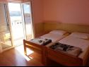 Apartments Jope - 60 m from beach: 1 - A0(4), 2 - A1(4), 3 - A2(4+2), 4 - A3(6+1), 5 - A4(4), 6 - A5(2), 7 - A6(2+1), 8 - A7(2+1), 9 - SA8(2), 10 - SA9(2), 11 - SA10(2) Stara Novalja - Island Pag  - Apartment - 8 - A7(2+1): bedroom