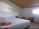 Apartments Zdrave - near beach: A1(3), A2(2+1), A3(3+1), A4(3), A5(3), A6(5+1), A7(5+1) Vlasici - Island Pag  - Apartment - A5(3): bedroom