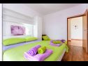 Apartments Nada- sea view: A1 - Ljubičasti (4+2), A2 - Crveni (4+2) Banjol - Island Rab  - Apartment - A1 - Ljubičasti (4+2): bedroom
