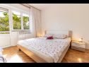Apartments Rezikica - green oasis; A1(7), A2(9) Palit - Island Rab  - Apartment - A1(7): bedroom