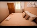Apartments and rooms Frane - with garden: A1(6), A2(4), SA3(2), R4 Franka(2), R5 Lucija(2) Palit - Island Rab  - Apartment - A1(6): bedroom