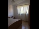 Apartments and rooms Mila - yard: A1(4+1), R1(2+1), R2(2) Supetarska Draga - Island Rab  - Apartment - A1(4+1): bedroom