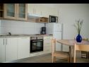 Apartments Coastal home - 10 m from the sea: A1(4+1), A2(2), A4(4+1), A5(4+1) Supetarska Draga - Island Rab  - Apartment - A4(4+1): kitchen and dining room