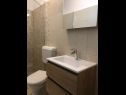 Apartments and rooms Mila - yard: A1(4+1), R1(2+1), R2(2) Supetarska Draga - Island Rab  - Apartment - A1(4+1): bathroom with toilet