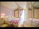 Apartments Mig - with beautiful garden: A1(2+1), A3(4+1), A4(4+1), A2(2+1) Supetarska Draga - Island Rab  - Apartment - A4(4+1): bedroom