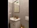 Apartments and rooms Mila - yard: A1(4+1), R1(2+1), R2(2) Supetarska Draga - Island Rab  - Room - R1(2+1): bathroom with toilet