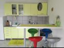 Apartments Xena - comfort and spacious: A1 Grey(4+2), A2 Red(2+2), A3 Purple(2+2), A4 Orange(2+2), A5 Green(2+2) Supetarska Draga - Island Rab  - Apartment - A5 Green(2+2): kitchen and dining room