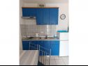 Apartments Marin - 100 m from beach: A1 blue(2+1), A2 red(2+1), A3 green(2+1), A4 orange(2+1), A5 silver(2+1) Pirovac - Riviera Sibenik  - Apartment - A1 blue(2+1): kitchen and dining room