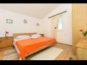 Apartments Srki - 50m from the sea: A1 prizemlje (4) , A2 kat (4) Rogoznica - Riviera Sibenik  - Apartment - A2 kat (4): bedroom