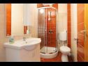 Apartments Lias - with restaurant: A1(2+2), A2(4+2), A3 (4), SA3 (2+1), A4(2+2), A5 prvi kat(2+2), A6 prvi kat(4+2), A7a drugi kat(5) Rogoznica - Riviera Sibenik  - Apartment - A4(2+2): bathroom with toilet