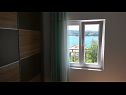 Apartments Janja - terrace and sea view A1(2+2), A2(4+1) Necujam - Island Solta  - Apartment - A2(4+1): bedroom