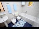Apartments Jagoda - next to the sea: A1(2+2), B2(2+2), C3(2+2), D4(2+2) Necujam - Island Solta  - Apartment - B2(2+2): bathroom with toilet