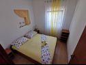 Apartments Goran - close to the sea & parking space: A1(4+2) Necujam - Island Solta  - Apartment - A1(4+2): bedroom