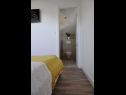 Apartments Špiro - parking and barbecue: A1 prizemlje(2+2), A2 potkrovlje(4+2) Kastel Novi - Riviera Split  - Apartment - A2 potkrovlje(4+2): bedroom
