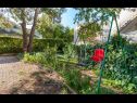 Apartments Vini- beautiful garden and terrase A4(4+2) Podstrana - Riviera Split  - courtyard