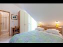 Apartments Vini- beautiful garden and terrase A4(4+2) Podstrana - Riviera Split  - Apartment - A4(4+2): bedroom