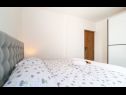 Apartments Tom - with hot tub: A1(6) Split - Riviera Split  - Apartment - A1(6): bedroom