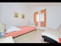 Apartments Ljuba - 200m from beach: A1 (2+2) ISTOČNI, A2(2+2) ZAPADNI Cove Ljubljeva (Vinisce) - Riviera Trogir  - Apartment - A1 (2+2) ISTOČNI: bedroom