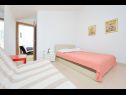 Apartments Ljuba - 200m from beach: A1 (2+2) ISTOČNI, A2(2+2) ZAPADNI Cove Ljubljeva (Vinisce) - Riviera Trogir  - Apartment - A1 (2+2) ISTOČNI: bedroom