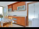 Apartments Ljuba - 200m from beach: A1 (2+2) ISTOČNI, A2(2+2) ZAPADNI Cove Ljubljeva (Vinisce) - Riviera Trogir  - Apartment - A1 (2+2) ISTOČNI: kitchen and dining room