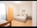 Apartments Ani - with pool and hot tub: A1(6), SA1 Zapadni(2), A2 Sjeverni(2), A3 Juzni(5) Seget Vranjica - Riviera Trogir  - Apartment - A1(6): bedroom