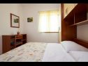 Apartments Mare - 30 m from pebble beach: SA1(2), SA2(2), A3(4+1), A4(4+1), A5(8) Seget Vranjica - Riviera Trogir  - Apartment - A3(4+1): bedroom