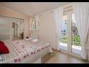 Apartments Dora - with nice courtyard: A1(4), SA2(3) Trogir - Riviera Trogir  - Apartment - A1(4): bedroom