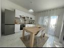 Apartments Paž - 28m from the beach: A1(4+2), A2(2+1), A3(4+1) Vinisce - Riviera Trogir  - Apartment - A1(4+2): kitchen and dining room