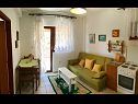 Apartments Ivo - barbecue: A1(2+1), A2(2+1) Vinisce - Riviera Trogir  - Apartment - A1(2+1): living room