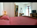 Apartments Ivo - barbecue: A1(2+1), A2(2+1) Vinisce - Riviera Trogir  - Apartment - A2(2+1): bedroom