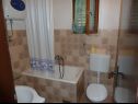 Apartments Maja - 80 m from pebble beach: A1(4+1) prizemlje, A4(4) kat, SA1 Istok(2), SA2 Zapad(2) Vinisce - Riviera Trogir  - Apartment - A1(4+1) prizemlje: bathroom with toilet