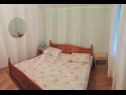 Apartments Maja - 80 m from pebble beach: A1(4+1) prizemlje, A4(4) kat, SA1 Istok(2), SA2 Zapad(2) Vinisce - Riviera Trogir  - Apartment - A4(4) kat: bedroom