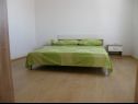 Apartments Ljubi - 20 m from beach: A1(4+1), A2 Crveni(2+2), A3 Zeleni(2+2) Vinisce - Riviera Trogir  - Apartment - A3 Zeleni(2+2): bedroom