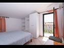 Apartments Din - 40 m from sea: A1(5+1), A2(2+1), A3(2+1), A4(2+2), A5(2+2) Kukljica - Island Ugljan  - Apartment - A4(2+2): bedroom
