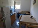 Apartments and rooms Aleksandra - 10 m from sea: A1 lijevi(2+2), A2 desni(2+2), A3(4+1), A4(2+2), R7(2), A5(4), A6(4+1) Bibinje - Zadar riviera  - Apartment - A5(4): kitchen and dining room