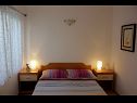 Apartments Davor - 20m from sea : A1(2+2), A2(2+2), A3(6) Mali Iz (Island Iz) - Zadar riviera  - Apartment - A1(2+2): bedroom
