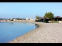 Apartments Let - 5 m from sea : A1(4), A4(4) Sukosan - Zadar riviera  - beach