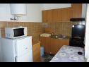 Apartments Bozica - 70m from the beach & parking: A1(4), A2-prvi kat(4+1), A3(4), A4-drugi kat(4+1) Vir - Zadar riviera  - Apartment - A1(4): kitchen and dining room